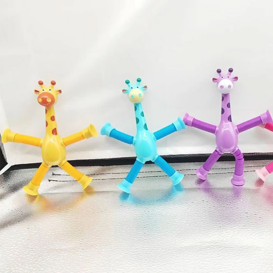 The Toyfetti Stretchy Giraffe Trio features yellow, blue, and purple bendable sensory toys with suction cup hands and feet—perfect for kids to fidget or stick upright on surfaces.