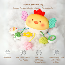 The Toyfetti Crabby Clip-On Sensory Toy is a colorful hanging baby activity plush with rattles, textured elements, and crinkles. Its soft, non-toxic, BPA-free, and perfect for crib or on-the-go playtime with developmental benefits.