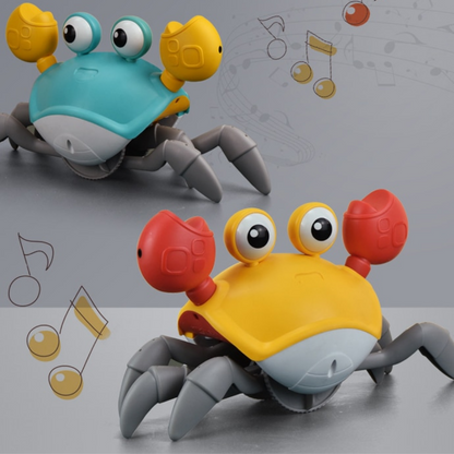Two HappyCrab – Crawling Companion with Lights & Music toys by Toyfetti, one blue and one yellow, feature big eyes and red claws on a gray surface with musical notes, suggesting these fun crabs play music and are perfect for tummy time.