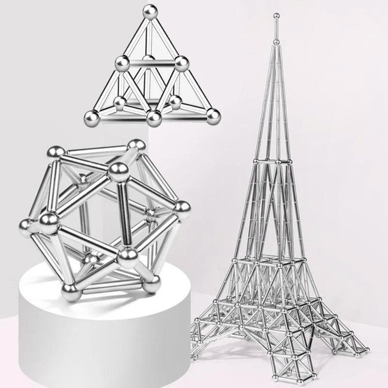 Three geometric sculptures made with the Toyfetti MagnoCraft Magnetic Building Set for Creative Kids display creativity and logic on a white surface, highlighting how the set boosts focus, spatial reasoning, and imagination.
