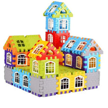 The Toyfetti House Building Blocks – Creative Architecture Toy for Kids features interlocking foam pieces in green, orange, blue, yellow, red, and gray to build a colorful toy house with gabled roofs, windows, and a central tower.