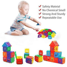 A young child builds with Toyfetti House Building Blocks – Creative Architecture Toy for Kids. Four check-marked features beside them: Safety Material, No Chemical Smell, Strong & Sturdy, Repeatable Use. Finished block creations are also shown.