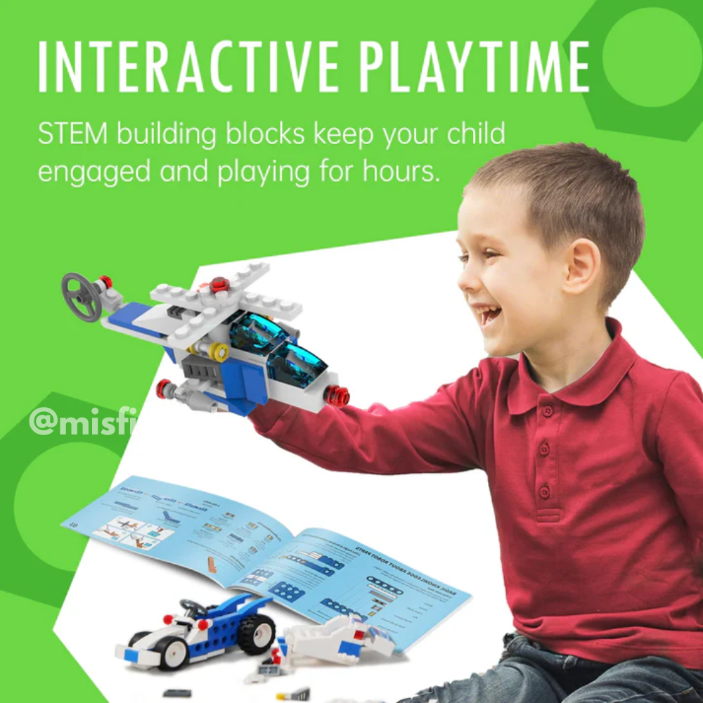 A smiling boy in a red shirt builds a blue and white helicopter from the Toyfetti Misfit BuildMaster 30-in-1 STEM Building Blocks Set (150+ pieces), with an open instruction booklet and toy car nearby. Text above reads INTERACTIVE PLAYTIME: Creative STEM Toys.