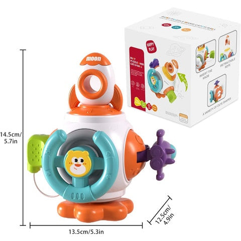 The Toyfetti Montessori Sensory Activity Cube – Press, Turn & Explore Learning Toy for Toddlers is a colorful, spaceship-shaped toy with an animal face, steering wheel, propeller, and handle. It measures 14.5 cm tall and promotes learning for toddlers.