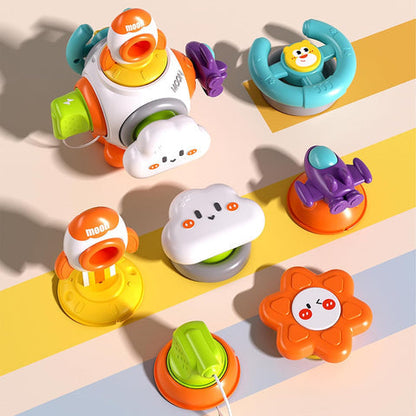 The Toyfetti Montessori Sensory Activity Cube is a colorful, cartoon-themed learning toy for toddlers, featuring smiling clouds, sun, moon, vehicles, and more—beautifully displayed on a striped pastel background.