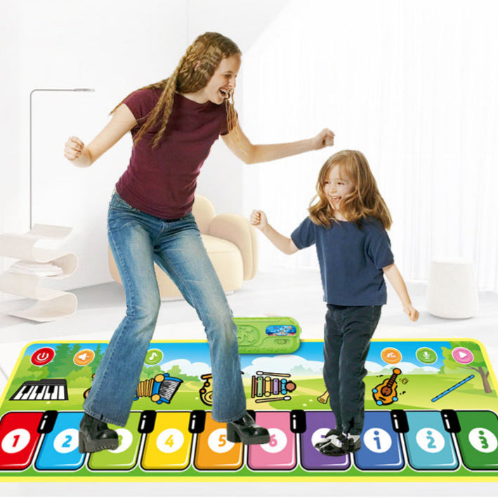 A woman and child joyfully dance on the Toyfetti Musical Dance Piano Mat – Movement & Music Fun for Toddlers, stepping across vibrant animal and note designs in a bright living room as they create happy memories together.