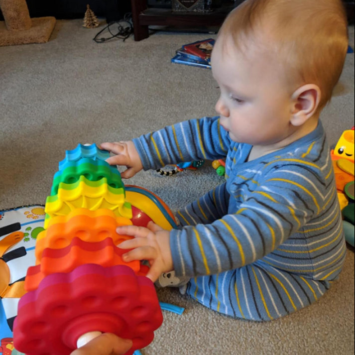 Rainbow Stacking Tower – Spinning Ring Toy for Motor Skills & Color Learning