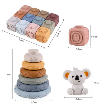 The Toyfetti CubbyKoala Soft Silicone Teether & Stacking Toy Set for Babies features sensory stacking rings, animal-shaped blocks, an embossed square block, and a smiling koala figurine; dimensions for each toy are shown in the image.