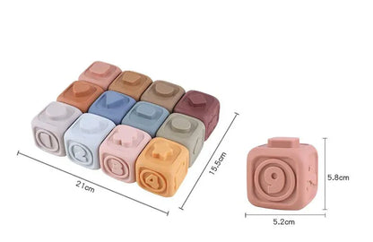The Toyfetti CubbyKoala Soft Silicone Teether & Stacking Toy Set includes 10 colorful cubes (5.2 x 5.8 cm each) with numbers 0–9, perfect for stacking, sensory play, and teething. Set size: 21 x 15.5 cm—ideal for little hands.