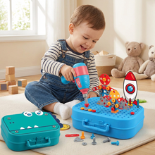 Child playing with a toy construction set on a mat in a room with toys and a teddy bear.