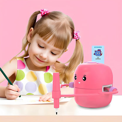 A young girl in a polka dot dress draws with a pencil beside ArtBot – Interactive Drawing Robot for Kids by Toyfetti, her smart drawing companion, at a table against a pink background as they learn to draw together.