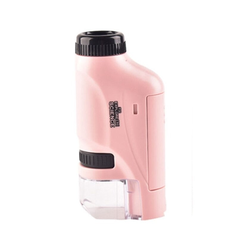 The Kids Pocket Microscope – Compact LED Microscope in pink features black dials and a clear viewing window, shown upright against a white background—an ideal portable science tool for curious young explorers.