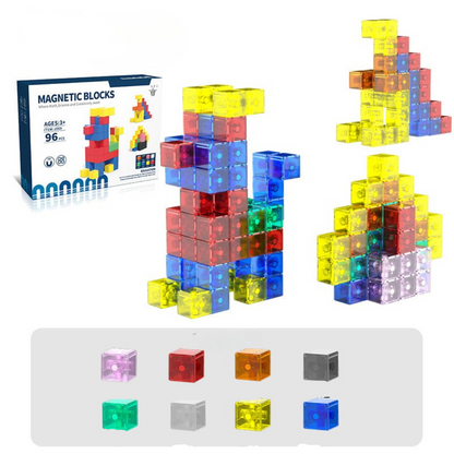 A Toyfetti Magnaplay | Creatief Bouwen Met Magneten - Magnetische Bouwblokken box sits beside colorful, interlocking magnetic cubes formed into shapes, inspiring creativiteit and enhancing motorische ontwikkeling, with a row of individual blocks below.