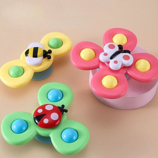 The Toyfetti Whirlie Baby Spinner set features three flower-shaped sensory spin toys—each with a cute insect (bee, butterfly, or ladybug)—perfect for fine motor development and fun baby travel play.