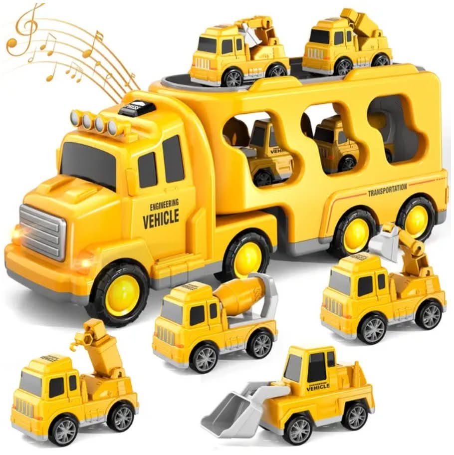 The Toyfetti MightyTrucks Builder Set features a yellow construction truck carrying 5 mini vehicles—crane, cement mixer, dump truck, bulldozer—with musical notes on the box, making it a perfect toddler gift.