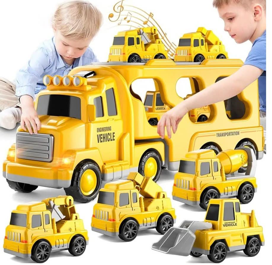 Two kids enjoy the Toyfetti MightyTrucks Builder Set, featuring a large yellow transport truck and mini construction vehicles like excavators and dump trucks—a perfect toddler gift. Illustrated musical notes add fun against the white background.