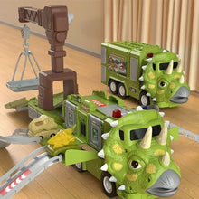 Two Toyfetti DinoTransporter trucks—T-Rex and Triceratops models with lights and sound—are linked on a play track. The Triceratops features a brown crane arm; both are detailed with horns and scales, shown on a wooden floor by beige curtains.
