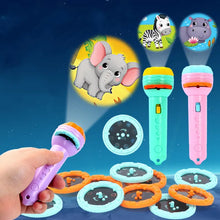 A hand holds the Toyfetti StoryLight Projector – Magical Bedtime Torch with 48 scene slides, projecting a cartoon elephant. Two more colorful projectors and animal-themed discs for creative storytelling are displayed on a blue background.