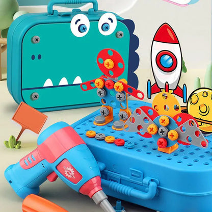 The Toyfetti Build & Screw Toolbox – Kids Drill & Design Set features a blue dino case, a safe electric drill, and buildable figures with screws and plastic parts. Fun cartoon rocket and playful decor add extra excitement for kids.
