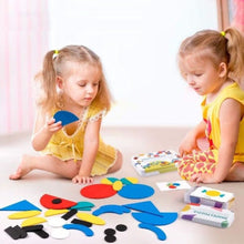 Two young girls in yellow play with the Toyfetti Montessori Pattern Puzzle – Wooden Shape Matching Set with 60 Challenge Cards, enjoying this screen-free activity surrounded by colorful shapes and cards in a bright room.
