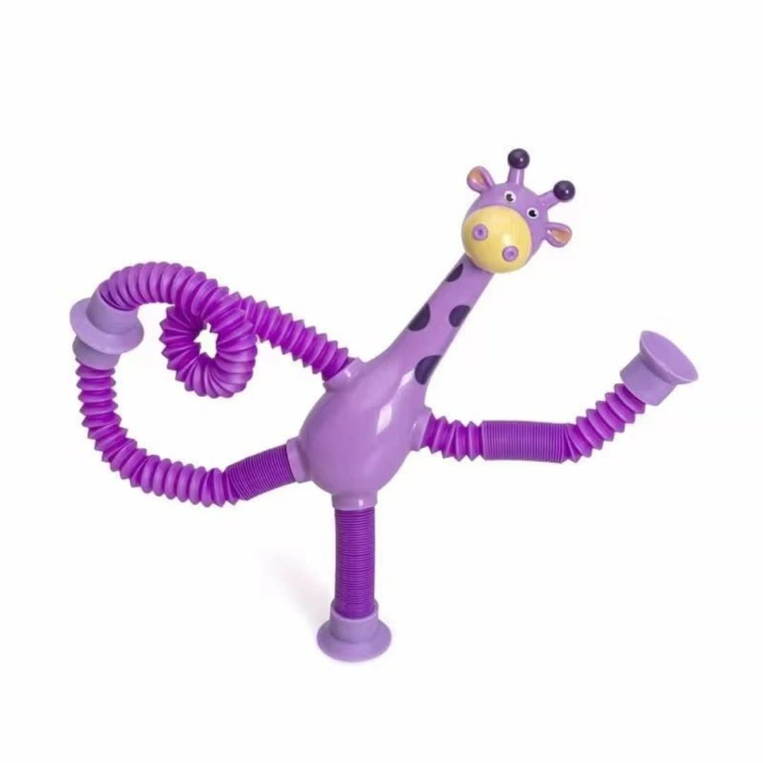 The Toyfetti Stretchy Giraffe Trio is a purple giraffe-shaped sensory toy with bendable accordion limbs, a yellow snout, and suction cups on its feet and tail—perfect as a fun toddler fidget or party favor.